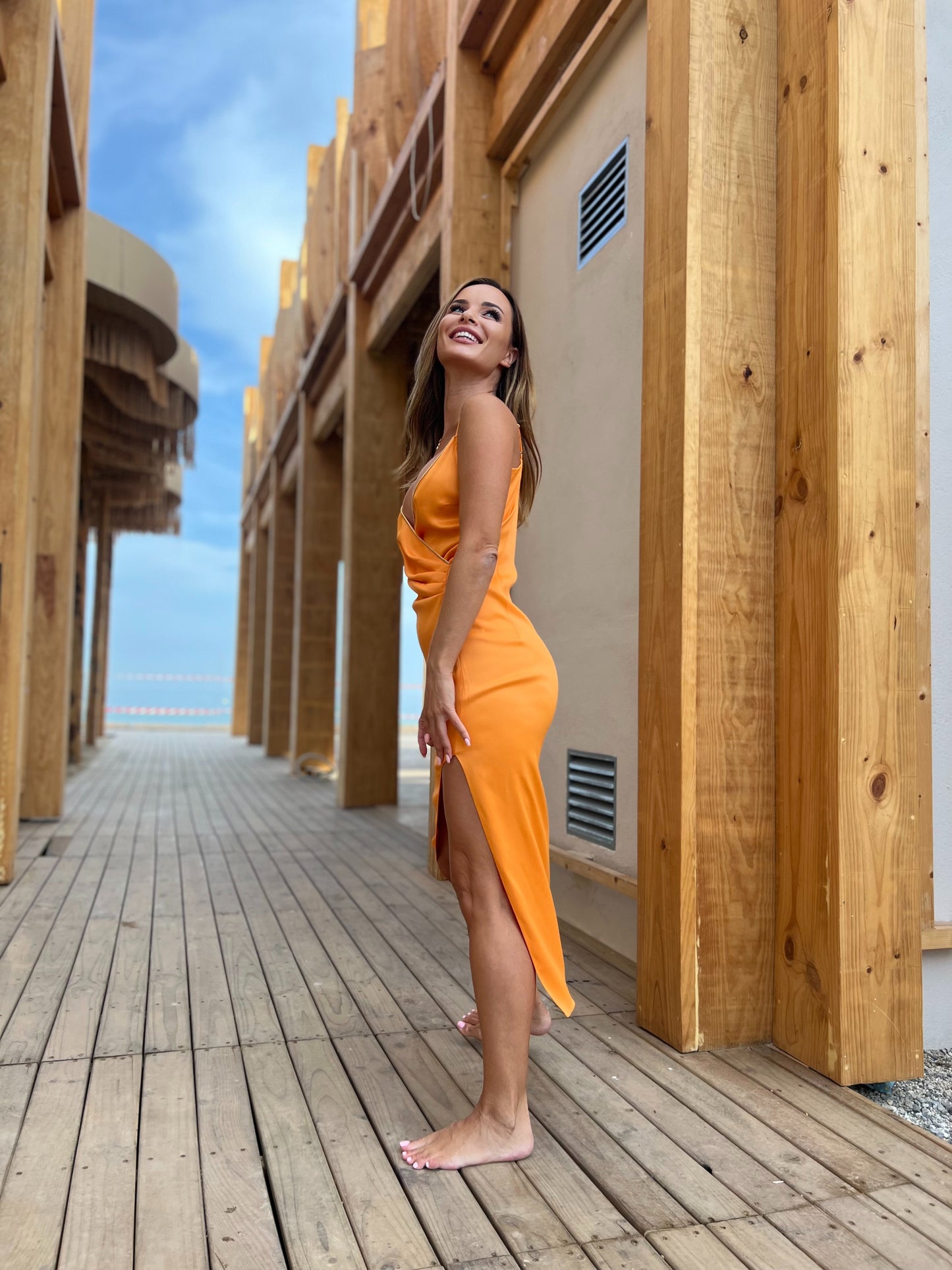 Asymmetrical orange  silky dress